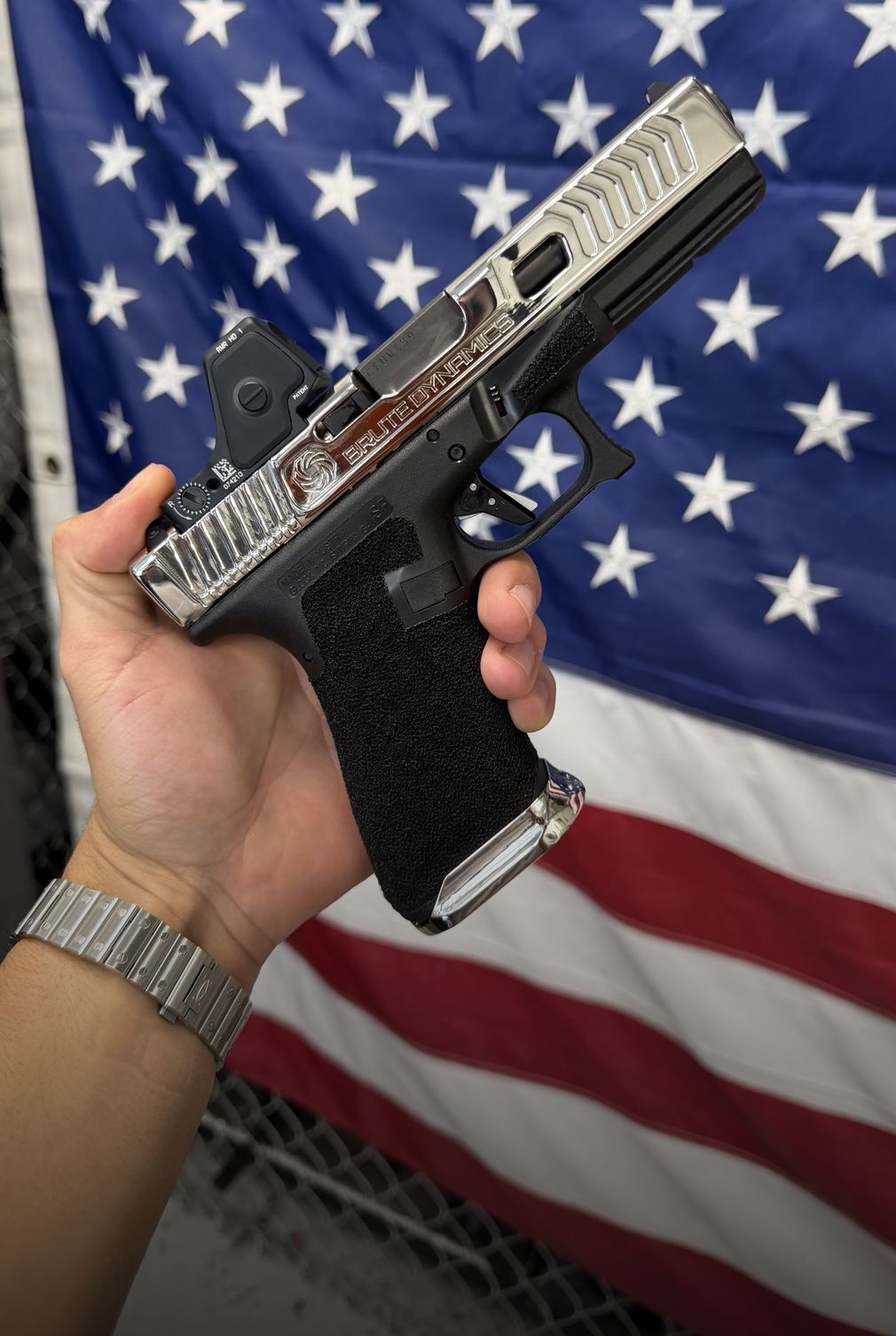 Nickel-Plated Glock with Brute Dynamics Engraving